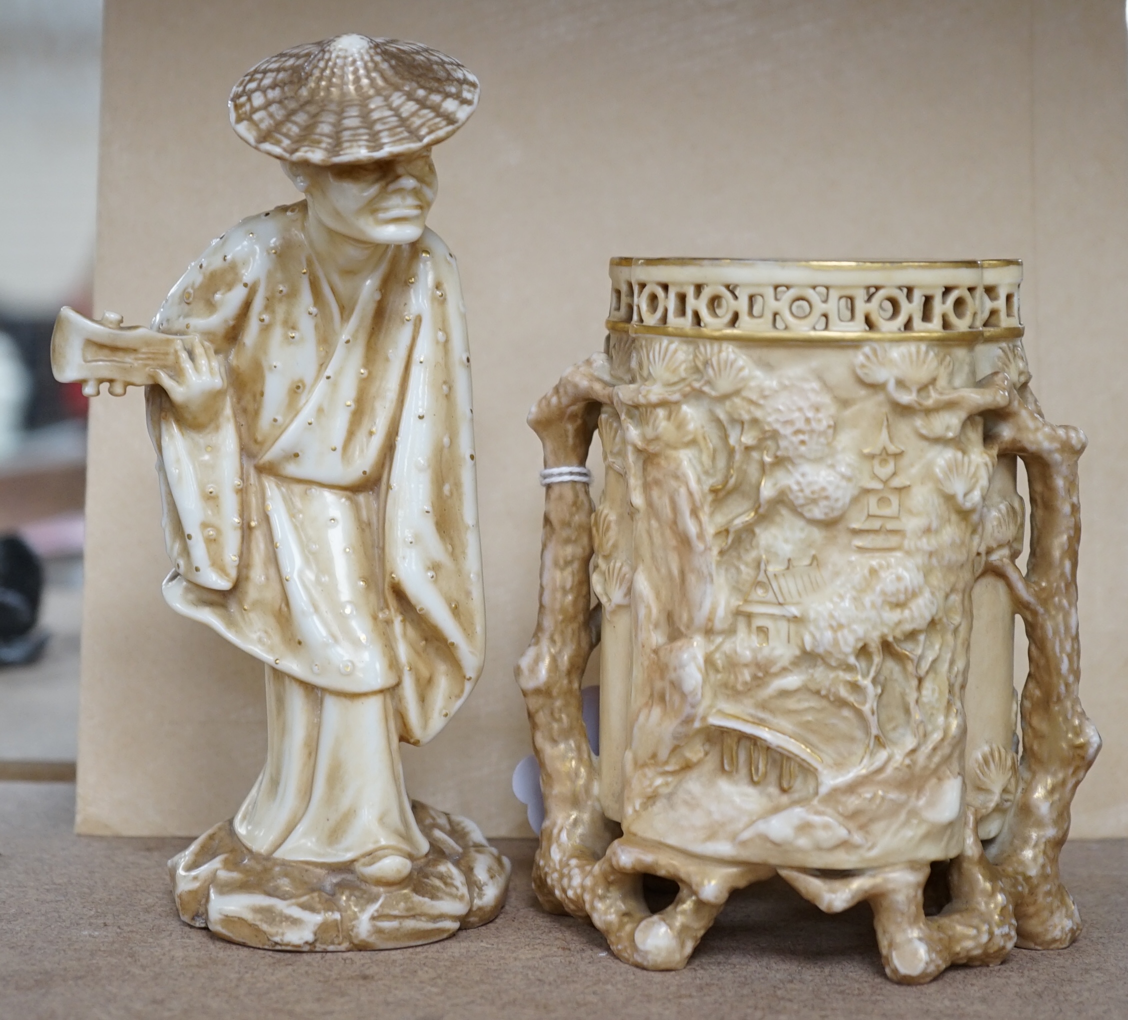 A Royal Worcester ivory ground Chinaman and related jar, tallest 16cm. Condition - worn